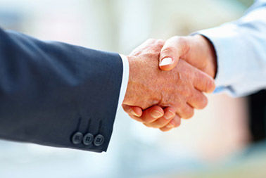 Corporate Counsel shaking hands